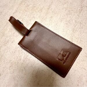 NWOT Cutter & Buck 19Crime brown genuine leather luggage tag.